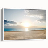 Framed canvas artwork depicting a serene beach landscape with soft pastel colors, showcasing gentle waves and a tranquil sky, designed to enhance home decor.