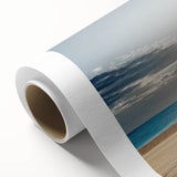 Colorful landscape canvas artwork depicting serene beach scenery with vibrant skies and gentle waves, elegantly rolled in a protective tube for easy display.