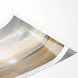 Vibrant rolled print showcasing a serene beach landscape with soft waves, golden sands, and a clear blue sky, packaged securely in a protective tube.