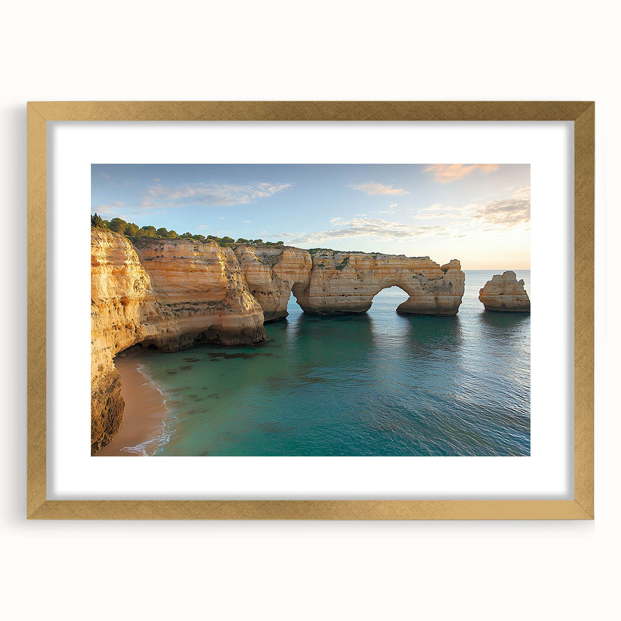 Framed landscape artwork depicting majestic cliffs, featuring a gold mat and frame, ideal for home decor enthusiasts seeking elegant wall accents.