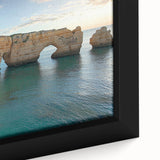 Close-up view of a framed canvas artwork depicting vibrant landscapes with dramatic cliffs, showcasing rich colors and intricate details, perfect for home decor.