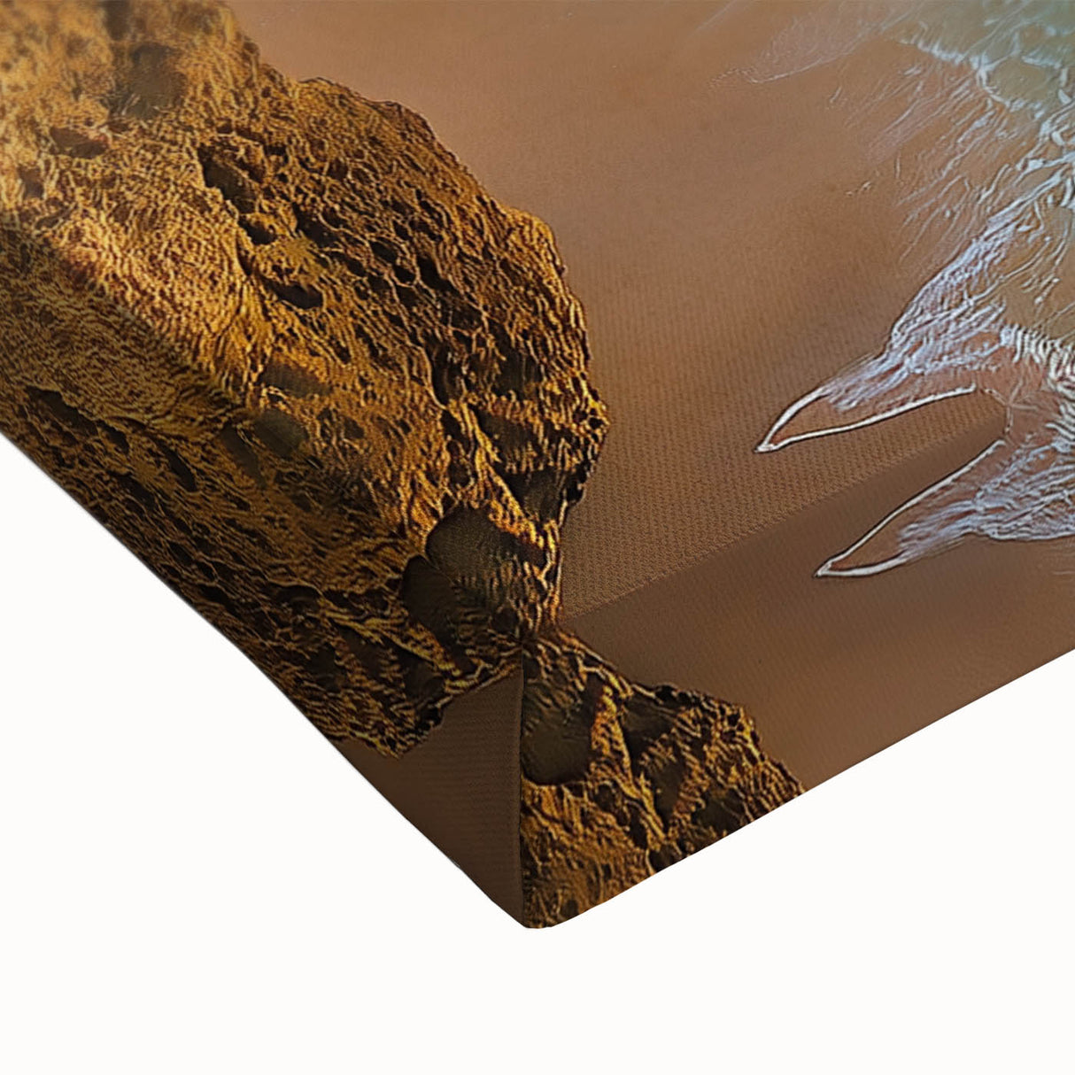 Close-up of a vibrant stretched canvas showcasing a dramatic cliff landscape, highlighting intricate textures and rich colors, perfect for home decor.