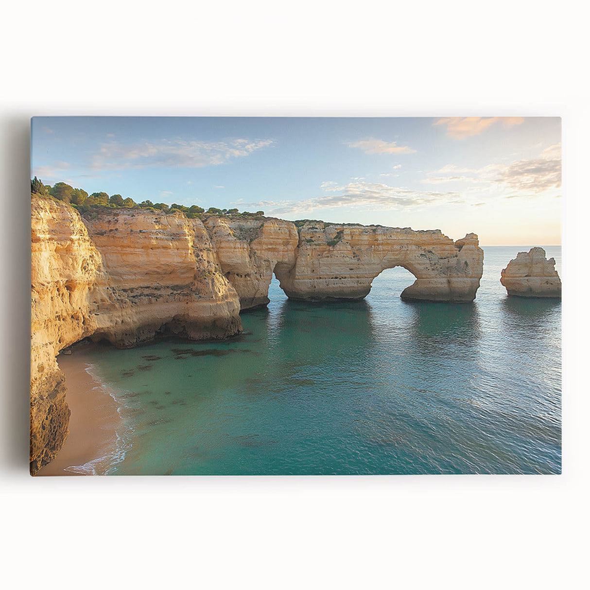 Stretched canvas artwork depicting a dramatic landscape with towering cliffs against a serene sky. Ideal for enhancing modern home decor or office spaces.