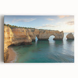 Stretched canvas artwork depicting a dramatic landscape with towering cliffs against a serene sky. Ideal for enhancing modern home decor or office spaces.