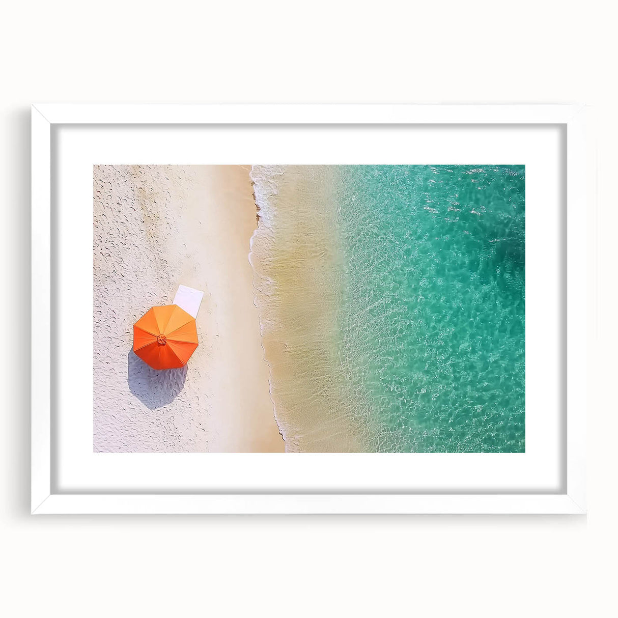 Framed landscape artwork depicting serene beach scenery with soft waves and sandy shores, featuring a white mat and elegant frame, perfect for coastal decor.