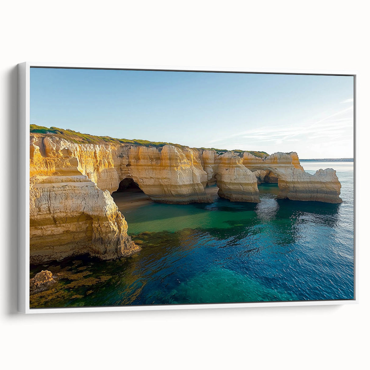 Framed canvas art depicting a breathtaking cliff landscape, showcasing vibrant colors and intricate details, with a sleek white frame emphasizing its elegance. Perfect for enhancing home decor with a touch of natural beauty.