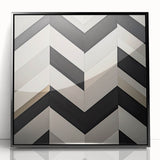 Abstract geometric framed acrylic artwork in black, showcasing sharp lines and dynamic shapes, ideal for modern decor. Perfect for enhancing contemporary interiors with a bold statement.