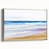 Framed landscape canvas art depicting vibrant beach scenery with silver accents, showcasing serene waves and golden sands, perfect for home decor.
