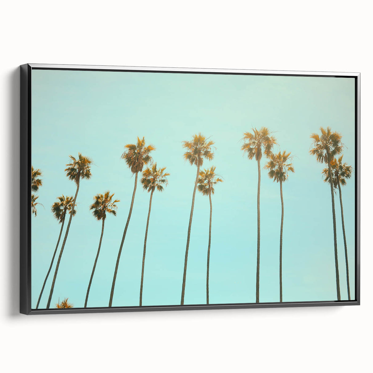 Black and white wall art featuring a vintage poster-style landscape painting on a framed canvas, ideal for bedroom decor.