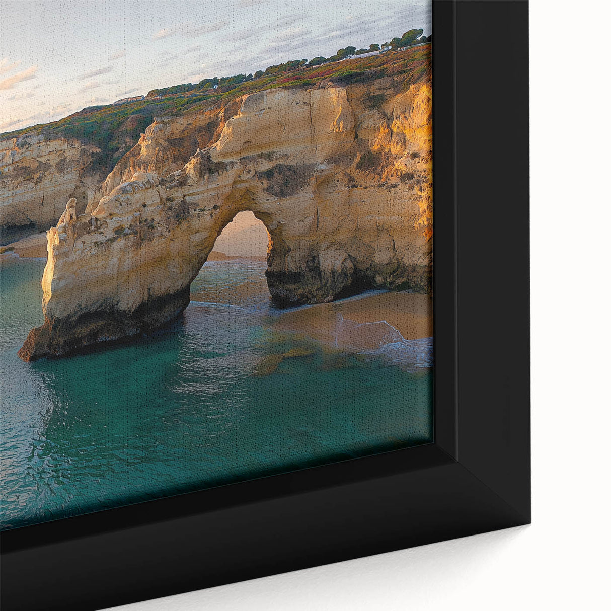 Close-up of a framed canvas artwork depicting a stunning cliff landscape, showcasing vibrant colors and intricate details, ideal for home decor or office aesthetics.