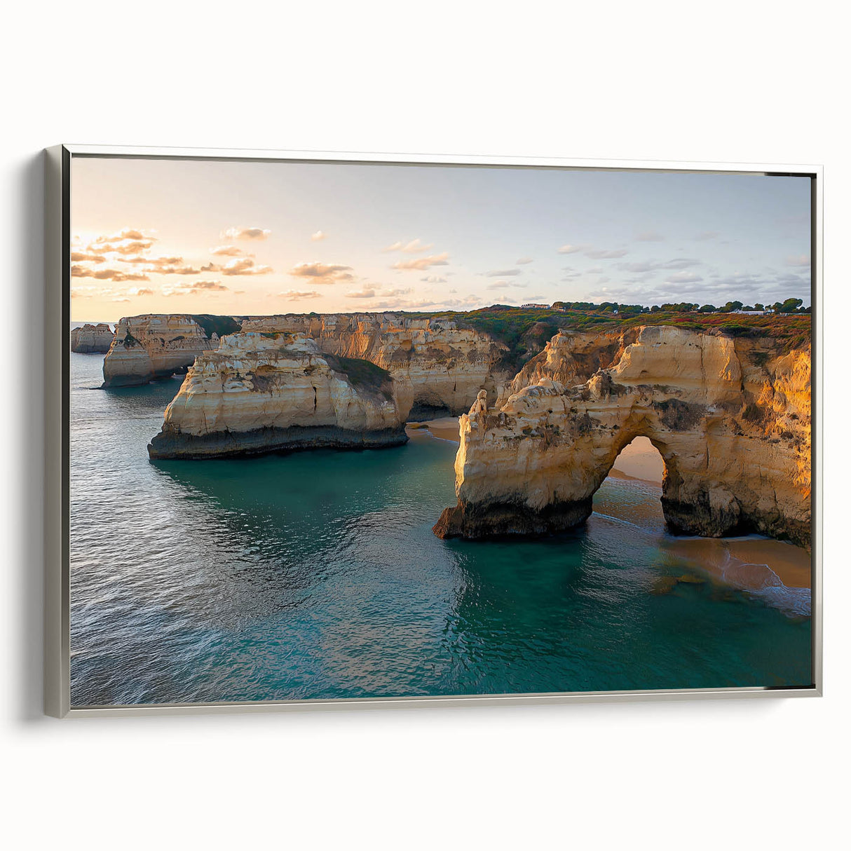 Framed canvas artwork depicting a scenic cliff landscape with vibrant colors, showcased from a silver side view, perfect for enhancing modern home decor.