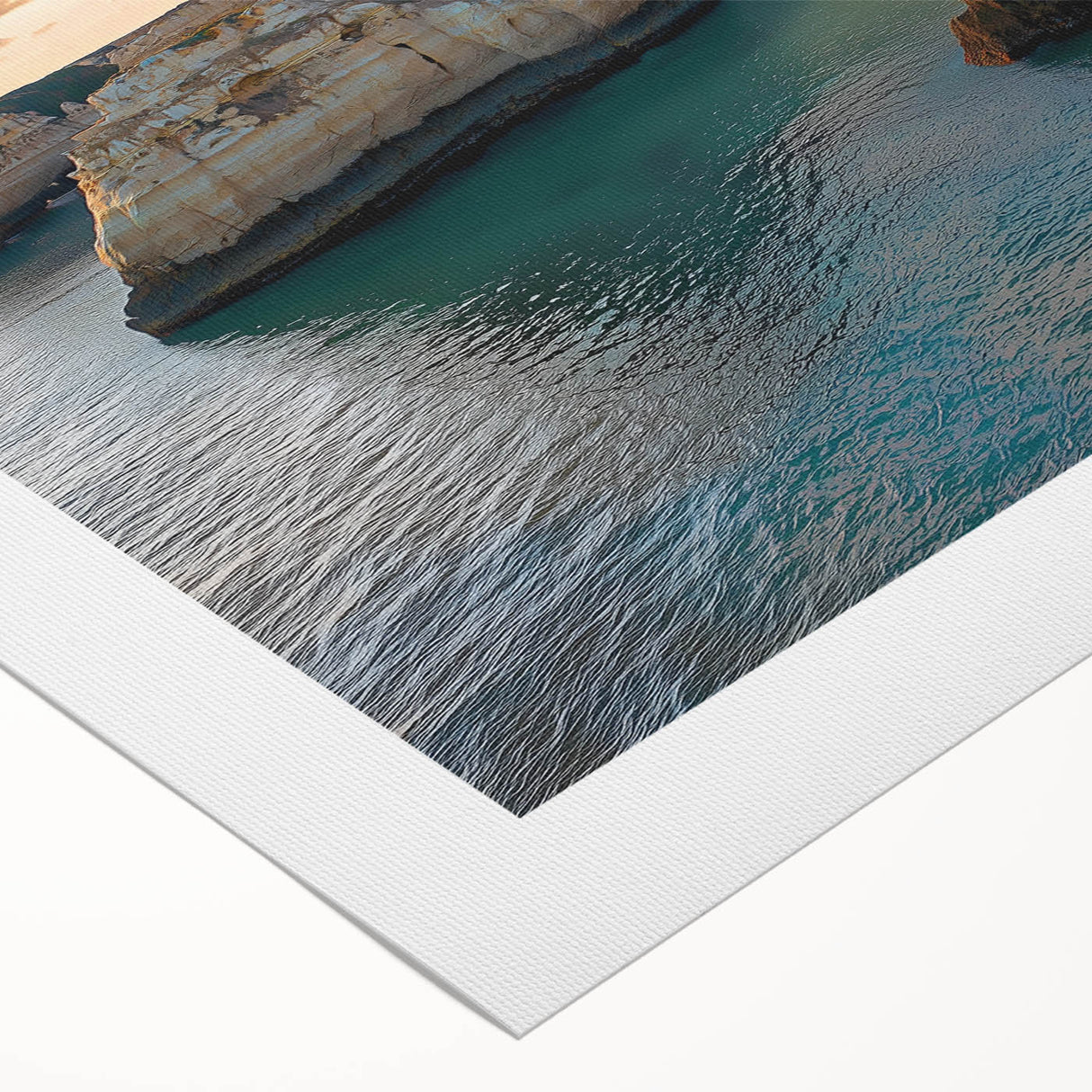 Vibrant rolled canvas artwork depicting a stunning landscape with dramatic cliffs under a clear blue sky, elegantly packaged in a protective cardboard tube. Perfect for home decor.