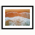 Black framed landscape art print featuring serene beach scene with gentle waves and soft clouds. Ideal for coastal home decor, enhancing tranquil ambiance.
