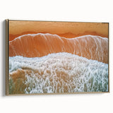 Framed canvas artwork showcasing a serene beach landscape with vibrant colors, elegantly bordered in gold, perfect for enhancing home decor in coastal-themed settings.
