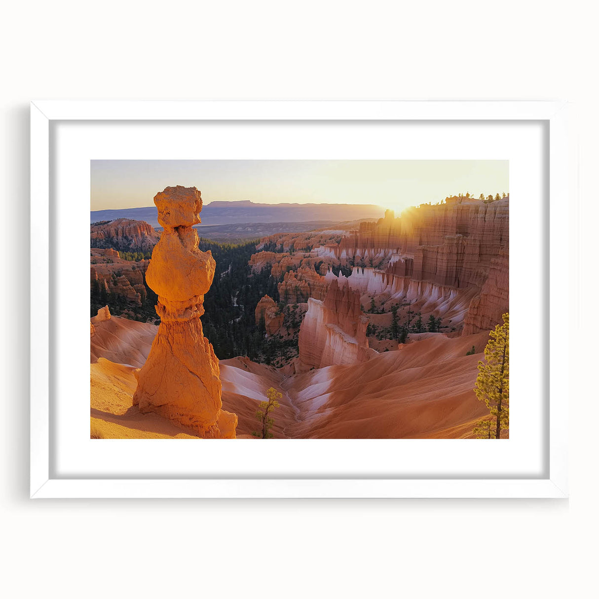 Framed landscape artwork of canyons with a white mat, showcasing vibrant earth tones and intricate details, perfect for home decor or office enhancement.