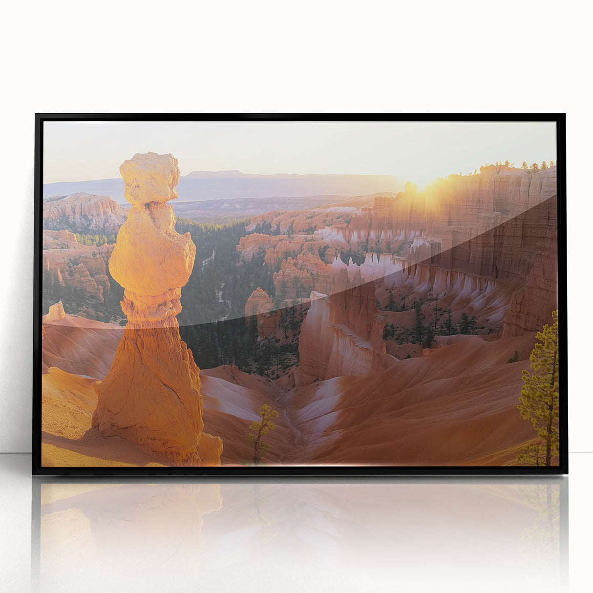 Framed acrylic artwork showcasing a stunning landscape of canyons in vibrant hues, featuring a sleek black frame that enhances its visual appeal, perfect for home decor.