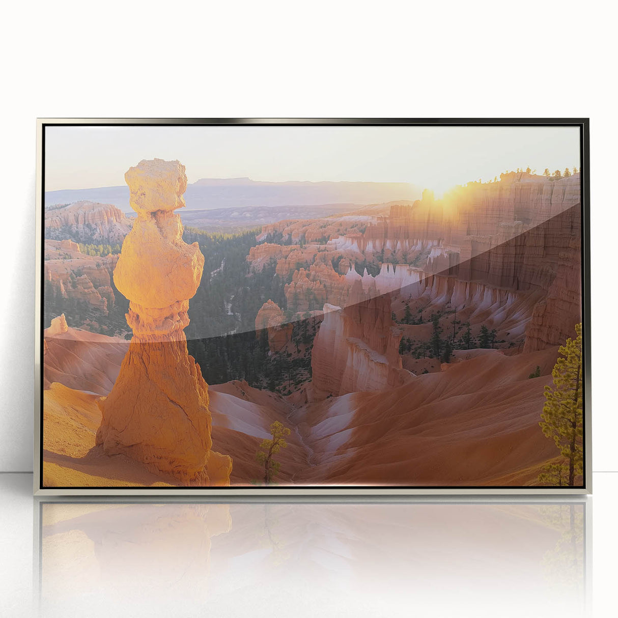 Framed acrylic artwork showcasing a stunning landscape of canyons in vibrant colors, set against a sleek silver frame, perfect for modern home decor.
