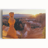 Stretched canvas artwork depicting a vibrant landscape of majestic canyons, showcasing rich earth tones and dramatic rock formations, perfect for enhancing any living space.