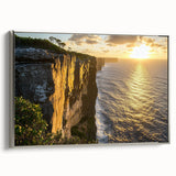 Framed canvas art depicting a scenic landscape of cliffs under a vibrant sky, showcasing silver accents on the frame for an elegant touch. Perfect for enhancing home decor.
