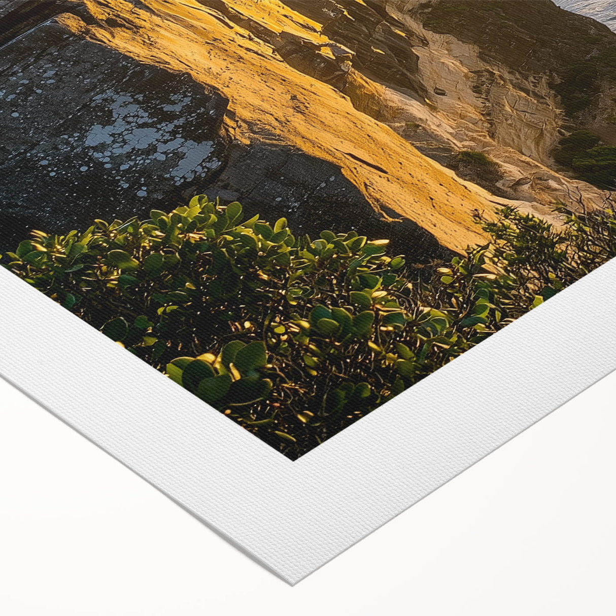 Vibrant rolled canvas depicting stunning coastal cliffs at sunset, showcasing rich colors and textures, ideal for enhancing modern home decor.