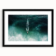 Black-framed landscape artwork showcasing a serene beach scene, featuring vibrant colors and intricate details, perfect for home decor or gallery display.