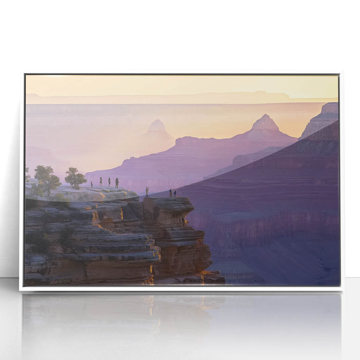 Framed acrylic landscape artwork depicting vibrant canyons in rich hues of red and orange, set in a sleek white frame, ideal for modern home decor.