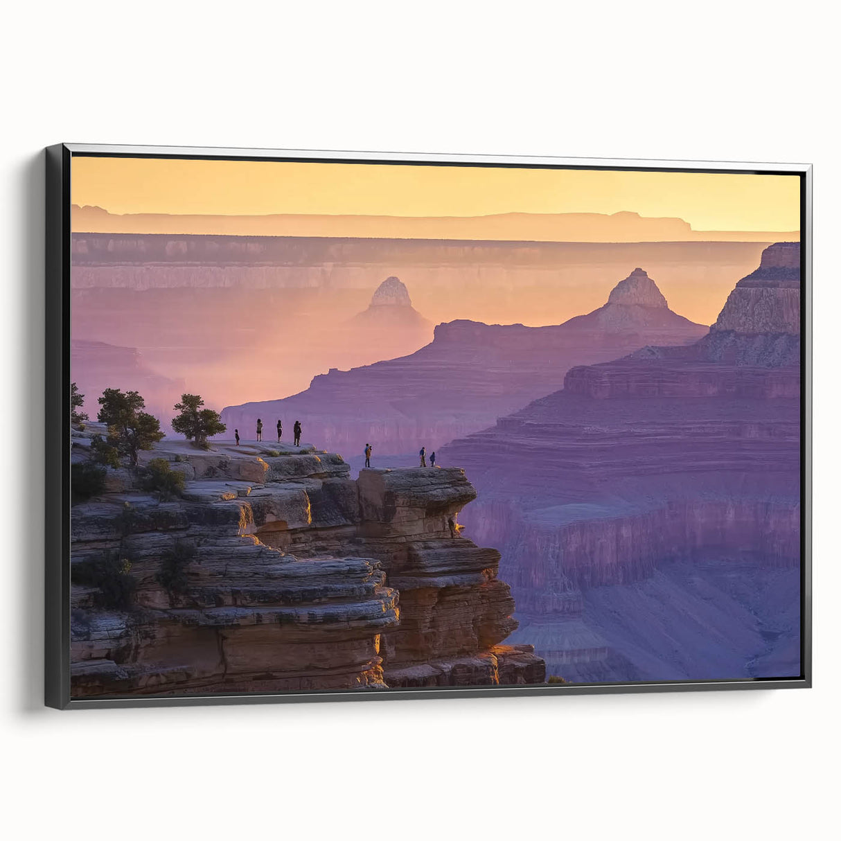 Framed landscape canvas art showcasing vibrant canyons in rich earth tones, set against a sleek black frame, perfect for enhancing home decor.