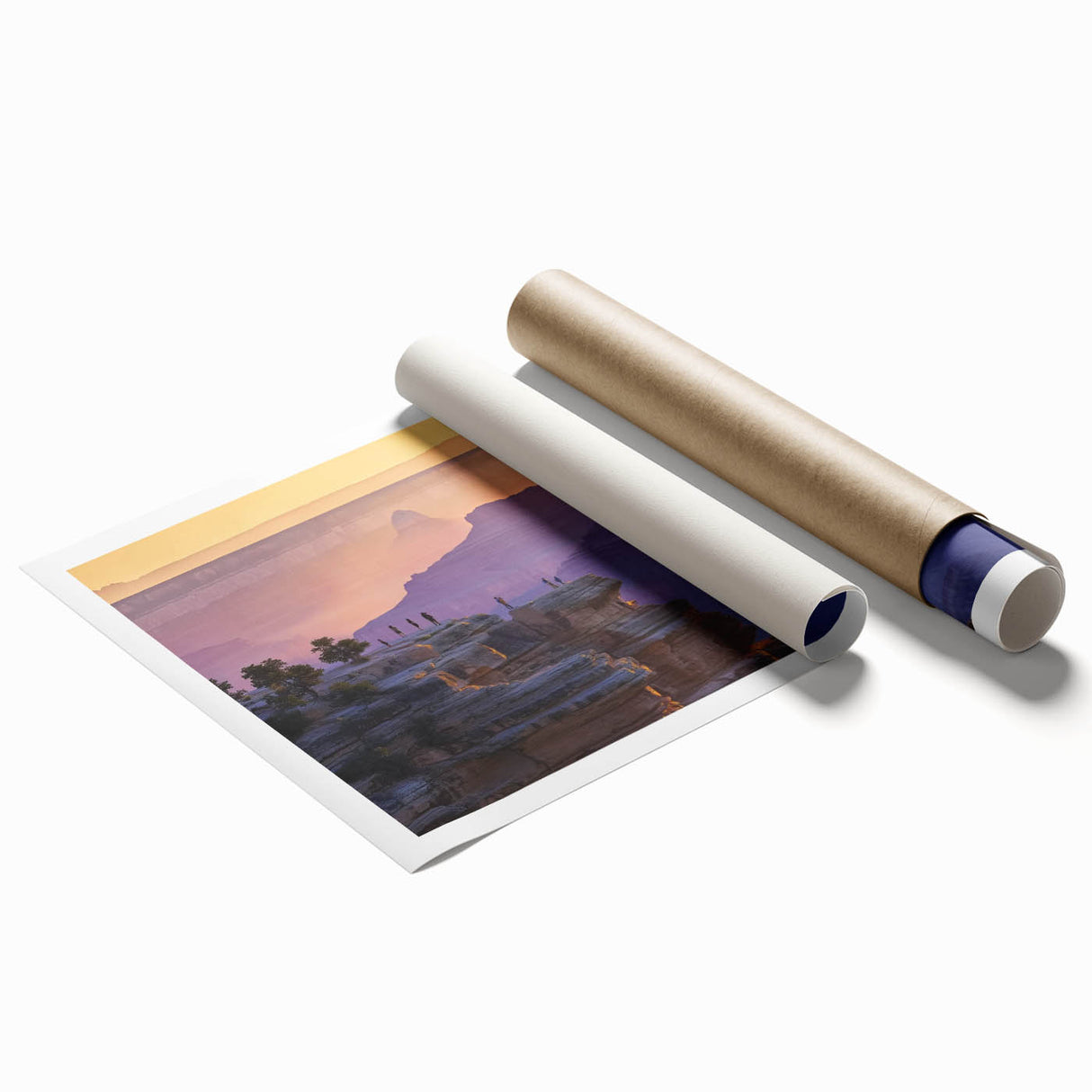 Landscape canyons print showcasing vibrant red and orange hues of sunset against rugged rock formations, rolled for easy shipping and display. Perfect for nature lovers and home decor enthusiasts.