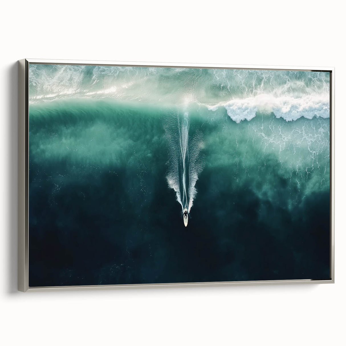 Framed canvas artwork depicting a serene beach landscape with vibrant colors, showcased in a sleek silver frame, perfect for enhancing coastal-themed decor.