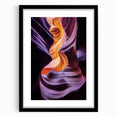 Black-framed landscape artwork showcasing vibrant canyons, presented with a white mat for added elegance, perfect for enhancing home decor.