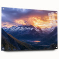 Acrylic landscape artwork depicting dramatic cliffs in vibrant hues, displayed in a sleek glass frame with pins for hanging, perfect for modern decor.