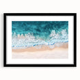 Black-framed landscape artwork depicting a serene beach scene, featuring soft waves and a clear sky, ideal for enhancing home decor with a coastal vibe.