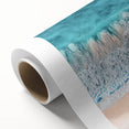 Vibrant rolled canvas artwork depicting a serene beach landscape with soft waves and golden sands, perfect for coastal-themed decor, packaged securely for delivery.