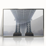 Framed acrylic artwork depicting a serene landscape featuring a bridge over a tranquil river, with lush greenery and soft clouds, perfect for home decor.