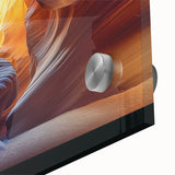 Abstract landscape artwork showcasing vibrant canyons in rich hues of orange, red, and blue, printed on acrylic glass, ideal for modern home decor accents.