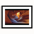 Landscape art print depicting a scenic canyon view, framed with a sleek black mat and showcasing vibrant earthy tones, ideal for home decor.