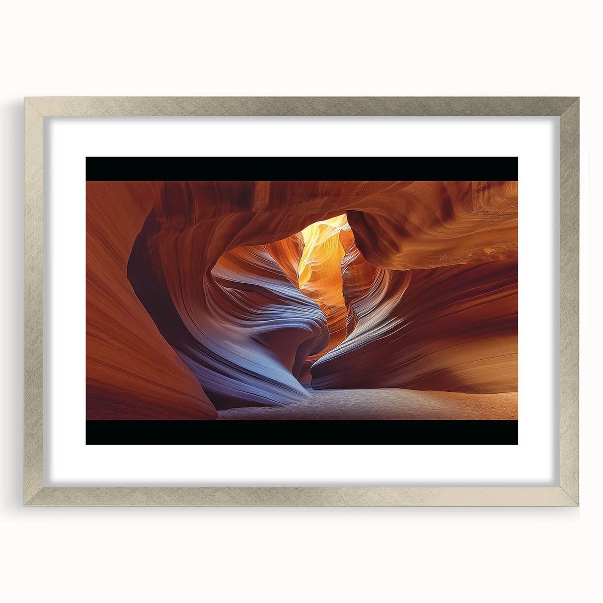 Framed landscape artwork depicting majestic canyons, featuring a sleek silver frame and white matting, perfect for enhancing modern home decor.