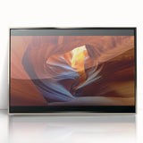 Framed acrylic print showcasing a vibrant landscape of canyons in earthy tones, designed to enhance modern decor with a sleek silver frame. Perfect for nature lovers.