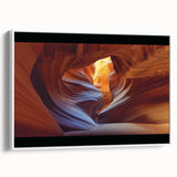 Framed landscape canvas showcasing a stunning canyon view with rich earthy tones, presented on a sleek white frame, perfect for home decor and art enthusiasts.