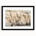 Black framed landscape art print showcasing vibrant canyons, featuring a textured mat for added depth. Perfect for enhancing home decor with nature's beauty.