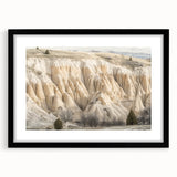 Black framed landscape art print showcasing vibrant canyons, featuring a textured mat for added depth. Perfect for enhancing home decor with nature's beauty.