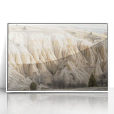 Framed acrylic artwork showcasing a stunning landscape of canyons with vibrant colors, ideal for enhancing home decor and adding a touch of nature's beauty.