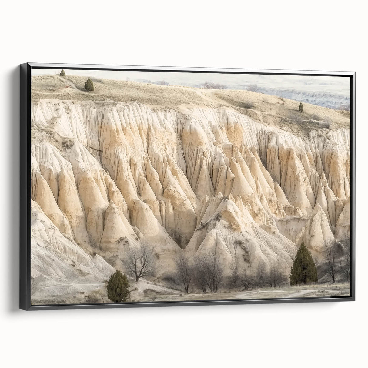 Framed canvas artwork depicting a vibrant landscape of canyons, showcasing rich colors and intricate details, with a sleek black frame adding elegance to any decor.