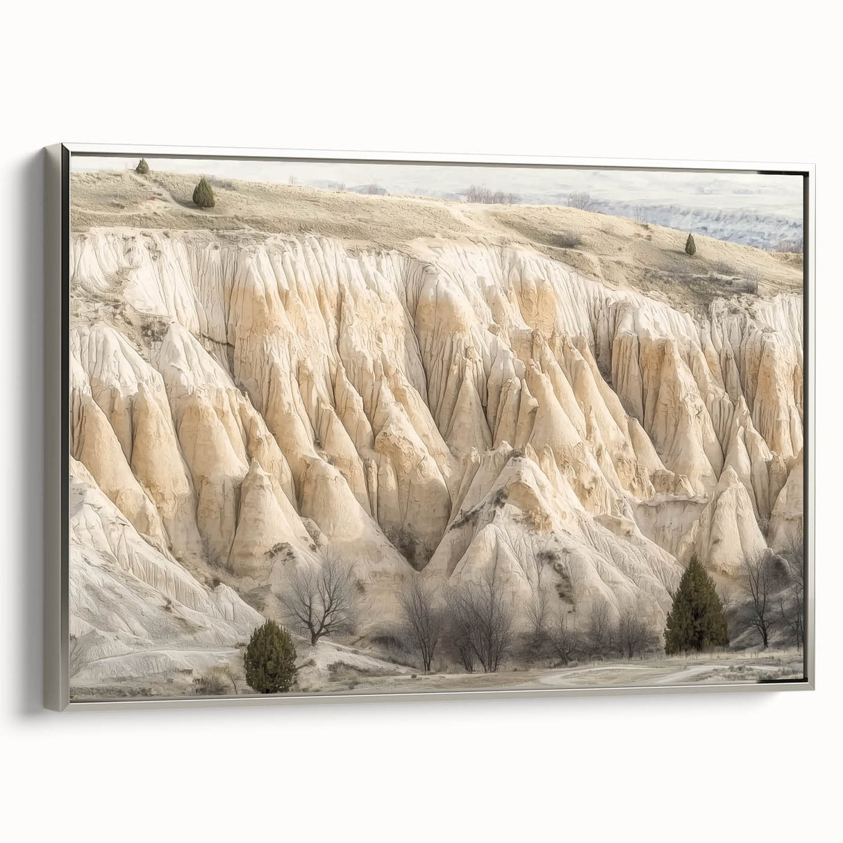 Framed landscape canvas showcasing vibrant canyons with rich colors, featuring a sleek silver frame, perfect for modern home decor and art enthusiasts.