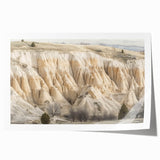 Vibrant landscape print showcasing majestic canyons in warm earth tones, rolled for easy shipping in a protective tube, perfect for home decor enthusiasts.