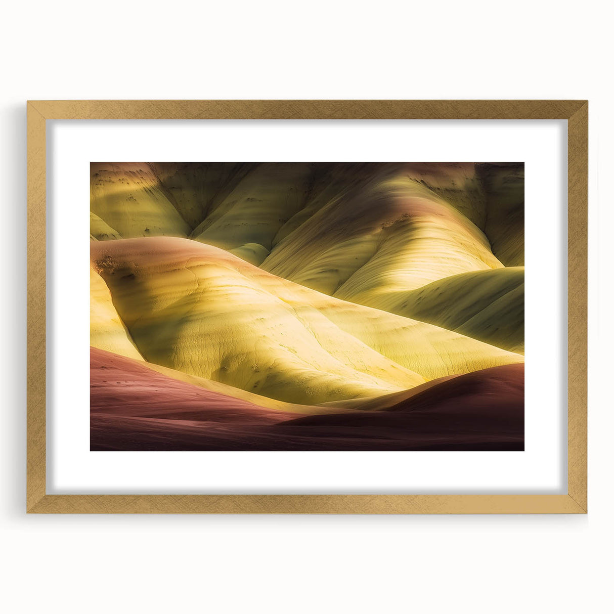 Gold-framed landscape art featuring majestic canyons, elegantly matted for a refined presentation, ideal for enhancing home decor with natural beauty.