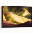 Framed canvas artwork depicting a stunning landscape of canyons in warm earth tones, showcasing intricate details and textures, ideal for home decor.
