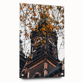 Large abstract wall art depicting autumn foliage in red and orange tones on acrylic glass.