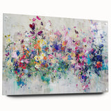 Abstract acrylic glass artwork displaying vibrant splatters in an array of colors, showcased from a side view with decorative pins, perfect for modern home decor.