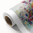 Abstract splattered canvas art showcasing vibrant colors like blue, pink, and gold, ideal for modern home decor, enhancing artistic ambiance in any room.